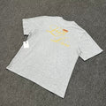 Aimé Leon Dore Gold Script Graphic Tee