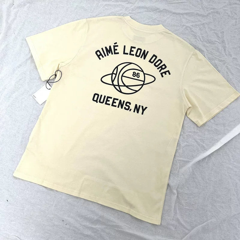 Aimé Leon Dore Queens Basketball Graphic Tee - Apricot